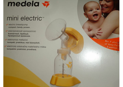 Новый электрический молокоотсос Medela Mini Electric.